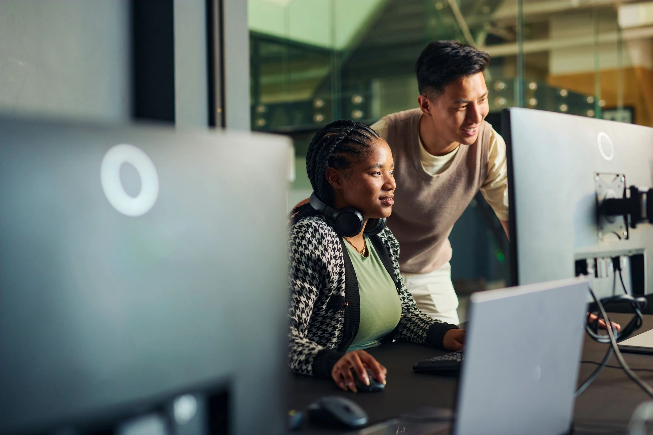 diverse IT professionals collaborating in modern office